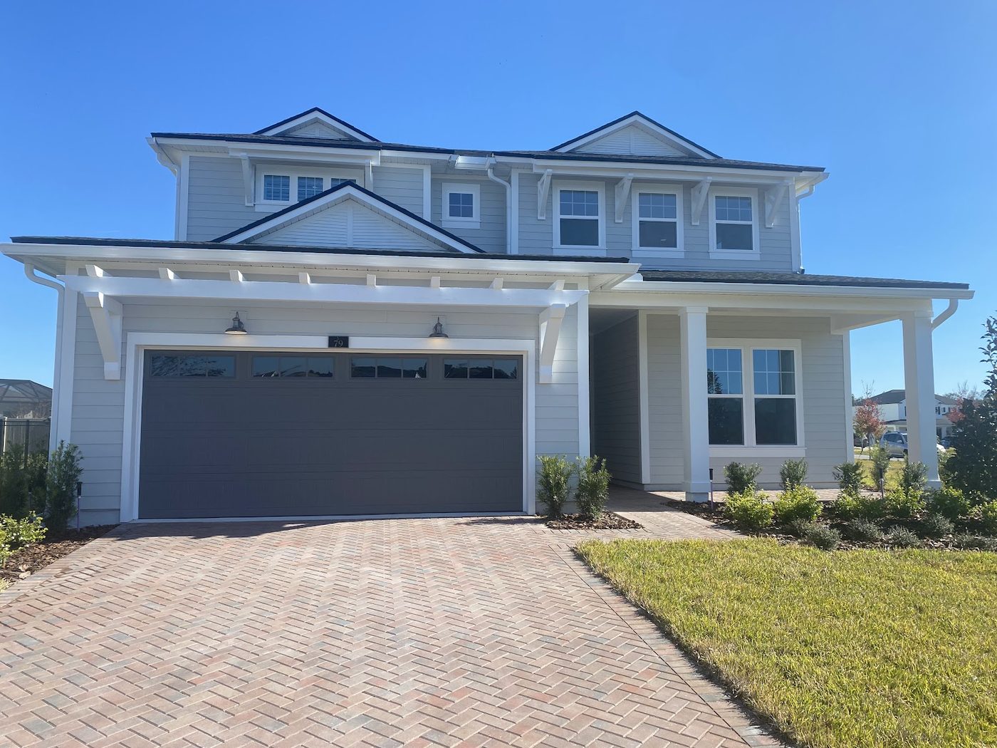 Seamless gutters on a two-story home near St. Augustine, FL